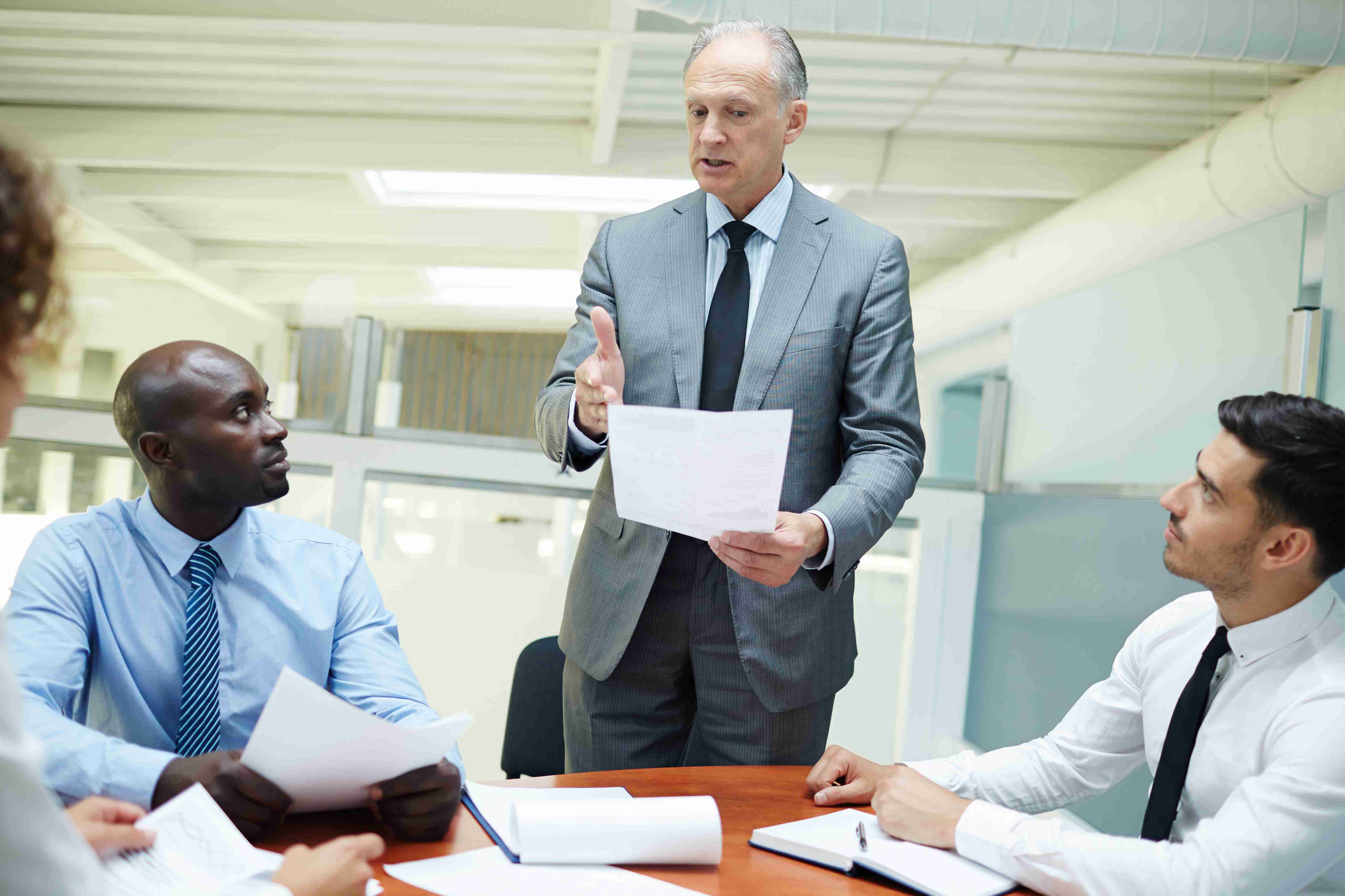 a man implementing a leadership development framework to his team